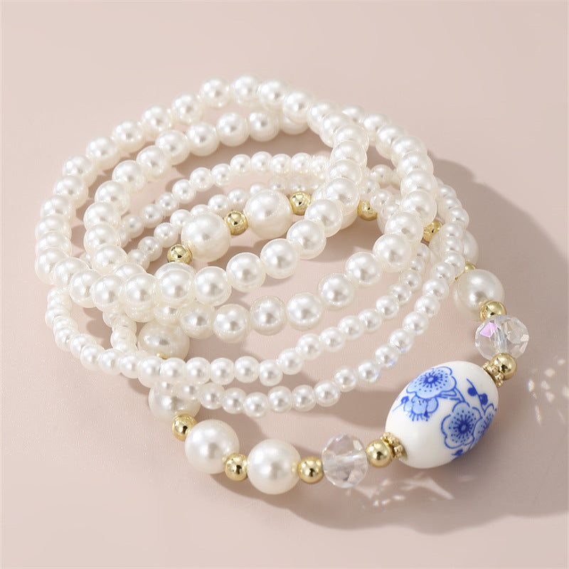 Conjunto de pulseras minimalistas florales vintage francesas para niñas hechas a mano con perlas de imitación y cuentas de cerámica, regalo elegante para cumpleaños o recuerdo de viaje