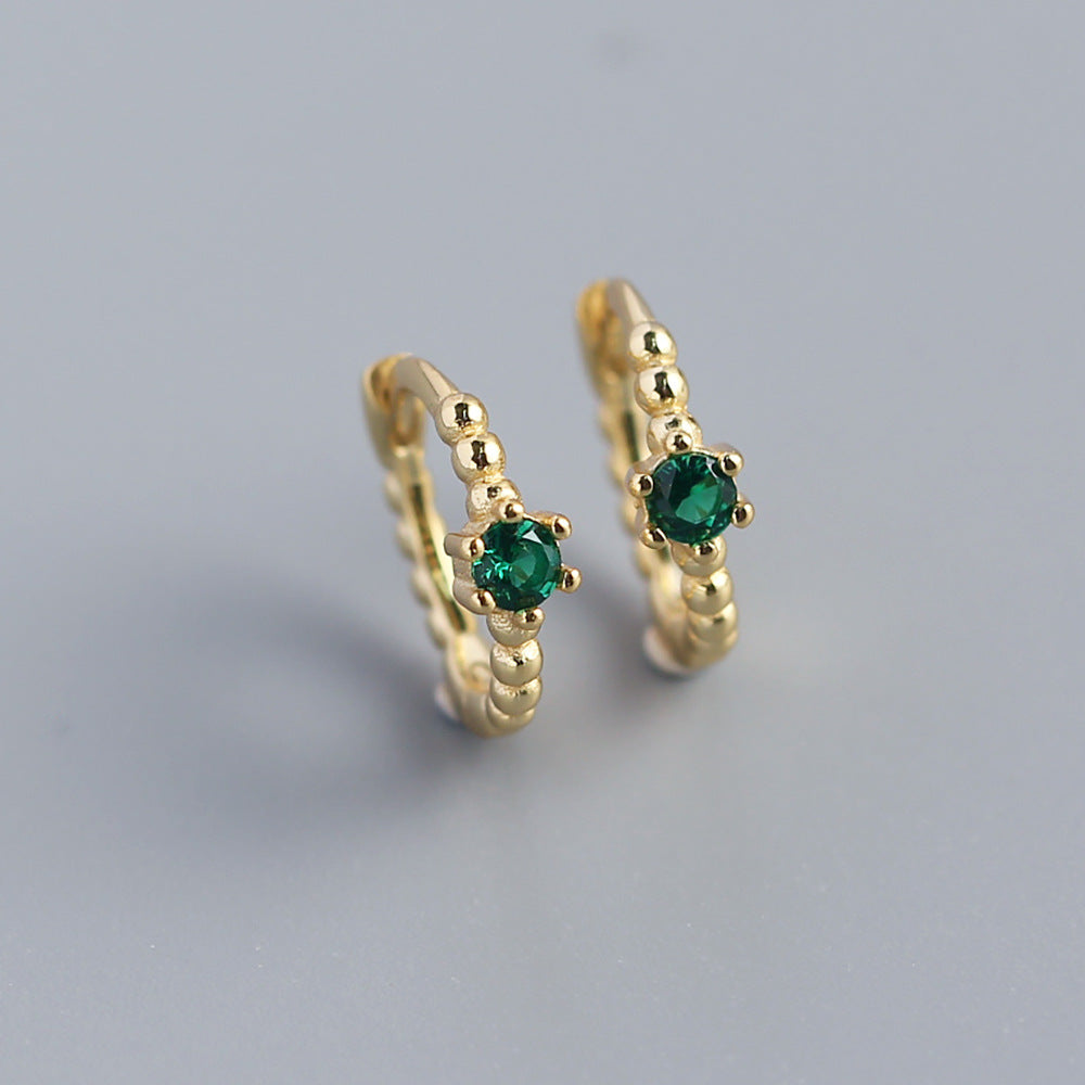 Orecchini a perno tondi con intarsi di diamanti in argento sterling 925