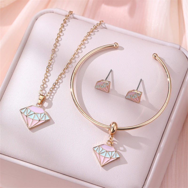 Juego de collar minimalista de aleación con forma de lazo con acabado esmaltado para niños, pulsera con colgante de nube y pendientes de tuerca