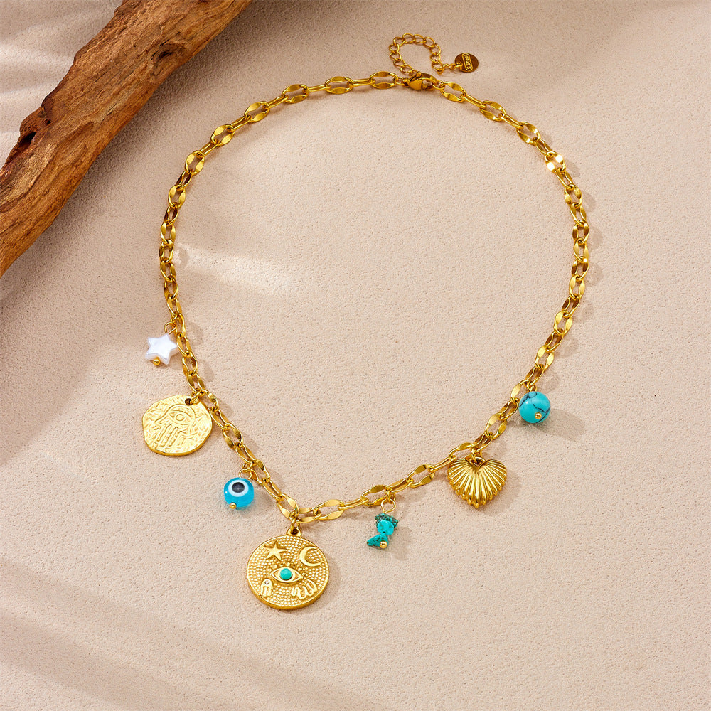 Collana con ciondolo a stella e cuore in stile vintage con intarsio in strass blu su catena a serpente in acciaio inossidabile da donna