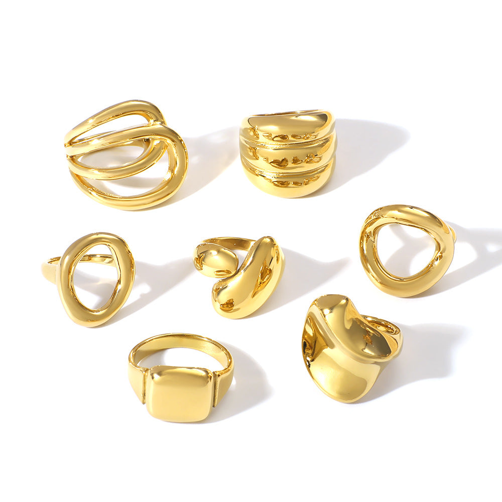 Anello Geometrico Intagliato in Acciaio al Titanio con Linee Accentate Placcate Oro 18K per Unisex