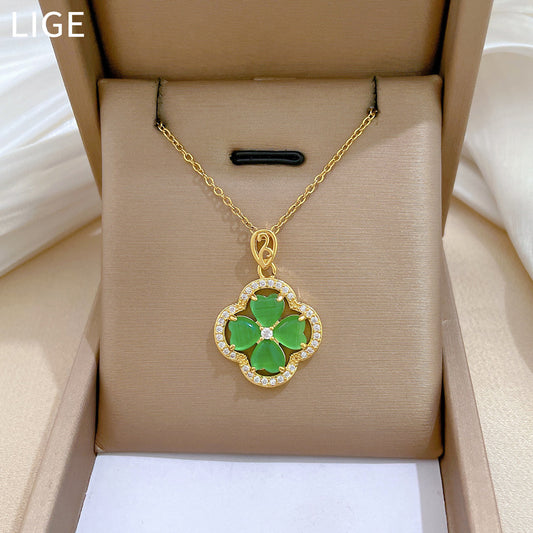 Collar con colgante de trébol de cuatro hojas estilo caricatura de acero inoxidable con incrustaciones de diamantes de imitación para mujer y unisex