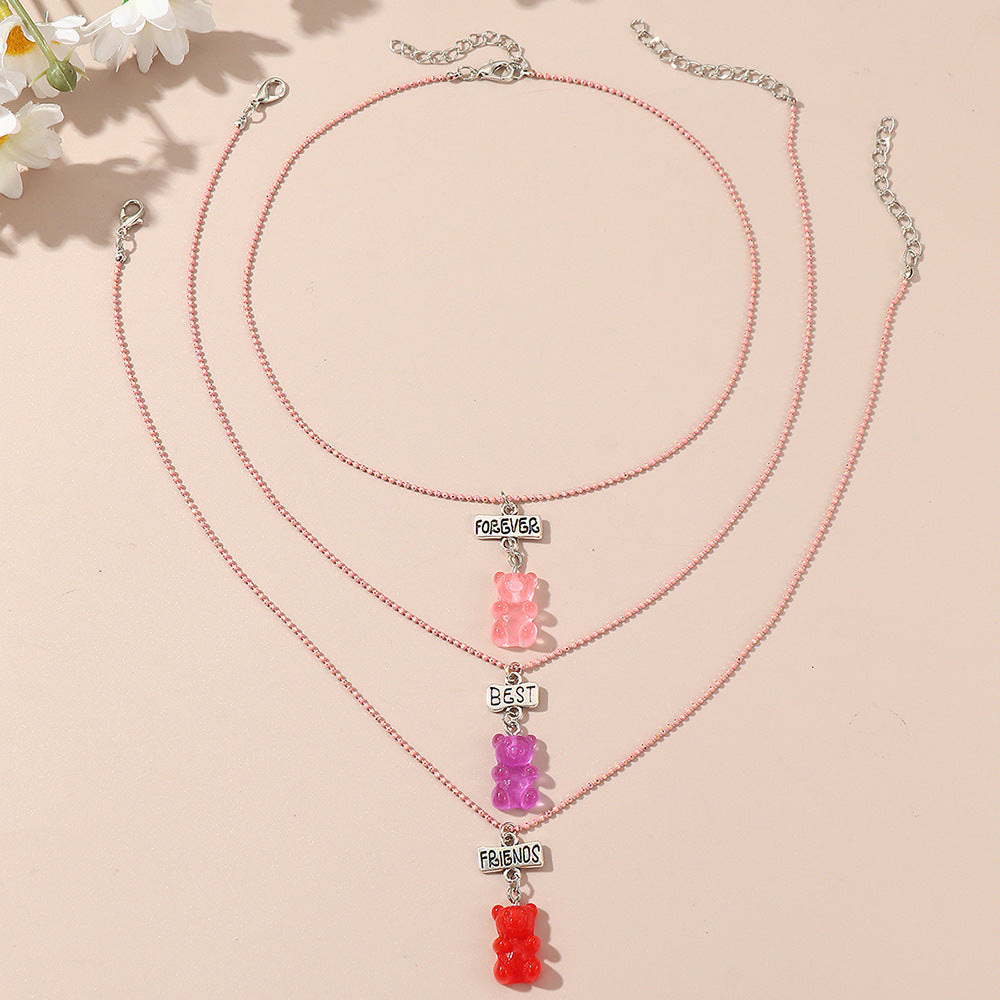 Set di collana in resina a forma di orsetto in stile fumetto per bambini con catena di perline rosa e lunghezza regolabile
