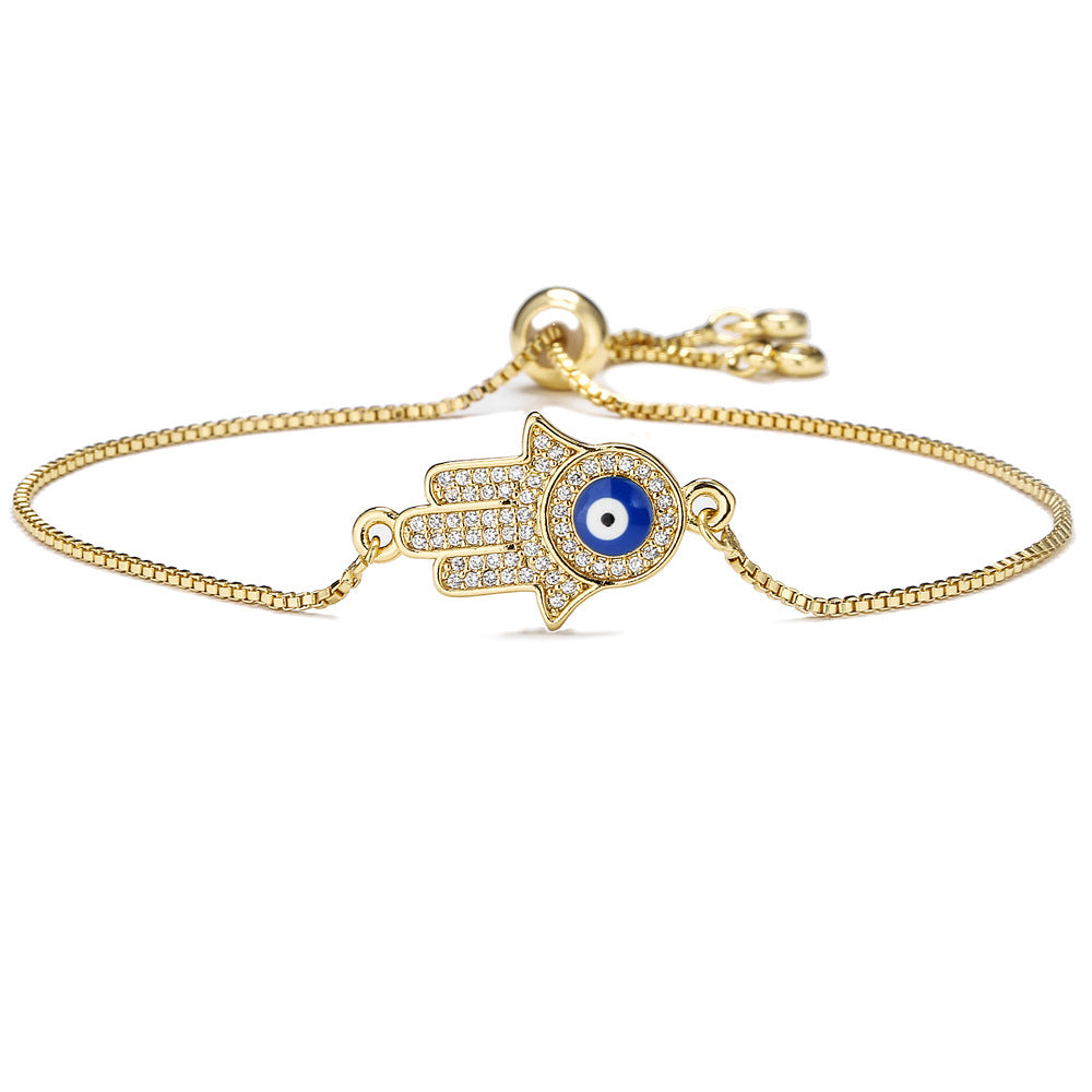 Exotic Geometric Evil Eye Hand Chain in Gold-Plated Copper with Micro-Pave Zirconia