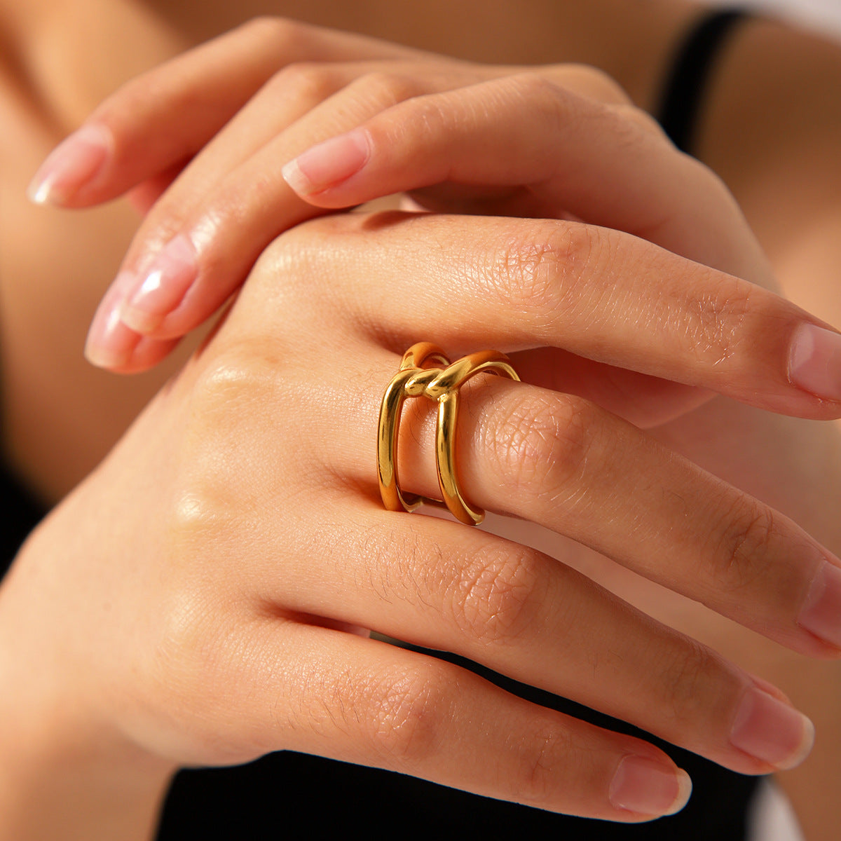 Geometric Hollow Titanium Steel Ring with Gold Plating and Knot-Cross Design for Women