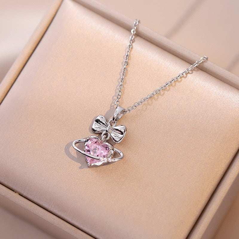 Sweet Minimalist Bow and Heart Shaped Titanium Steel Pendant Necklace with Rhinestone Inlay on O-Chain for Women