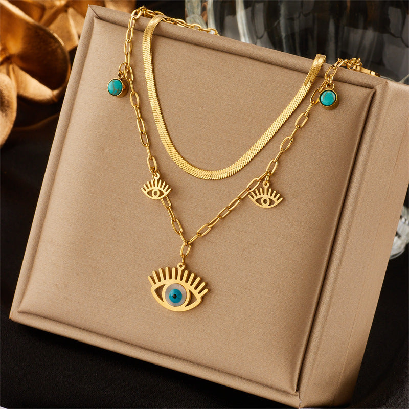 Collana con Pendente Occhio Turco Etnico Minimalista Vintage in Acciaio al Titanio con Finitura Placcata e Catena a Serpente