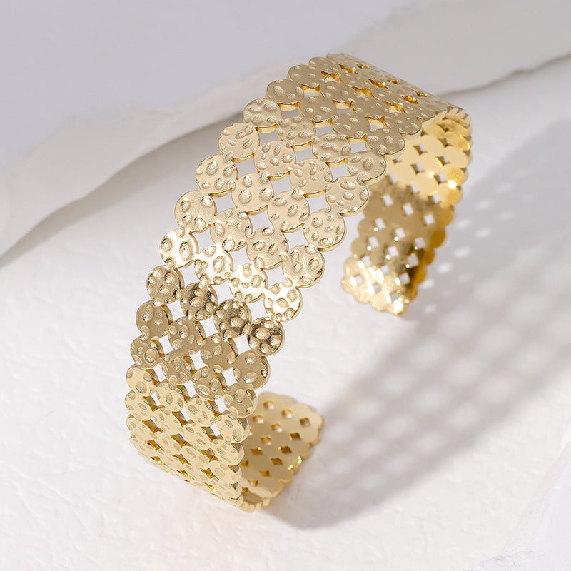 Bracciale rigido aperto geometrico in acciaio inossidabile da donna con finitura placcata e aspetto metallico di lusso