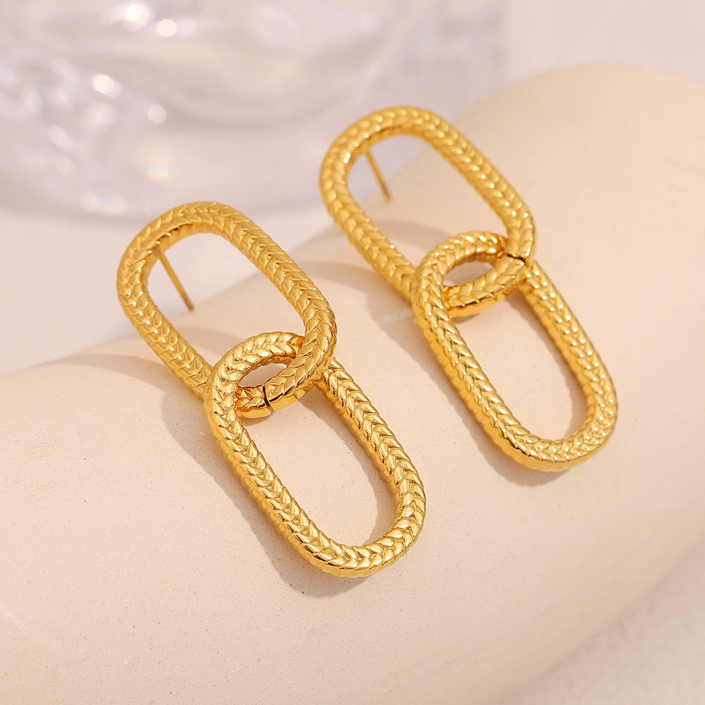 Orecchini minimalistici moderni geometrici in acciaio inossidabile con placcatura in oro 18 carati e doppio cerchio testurizzato a pelle di serpente
