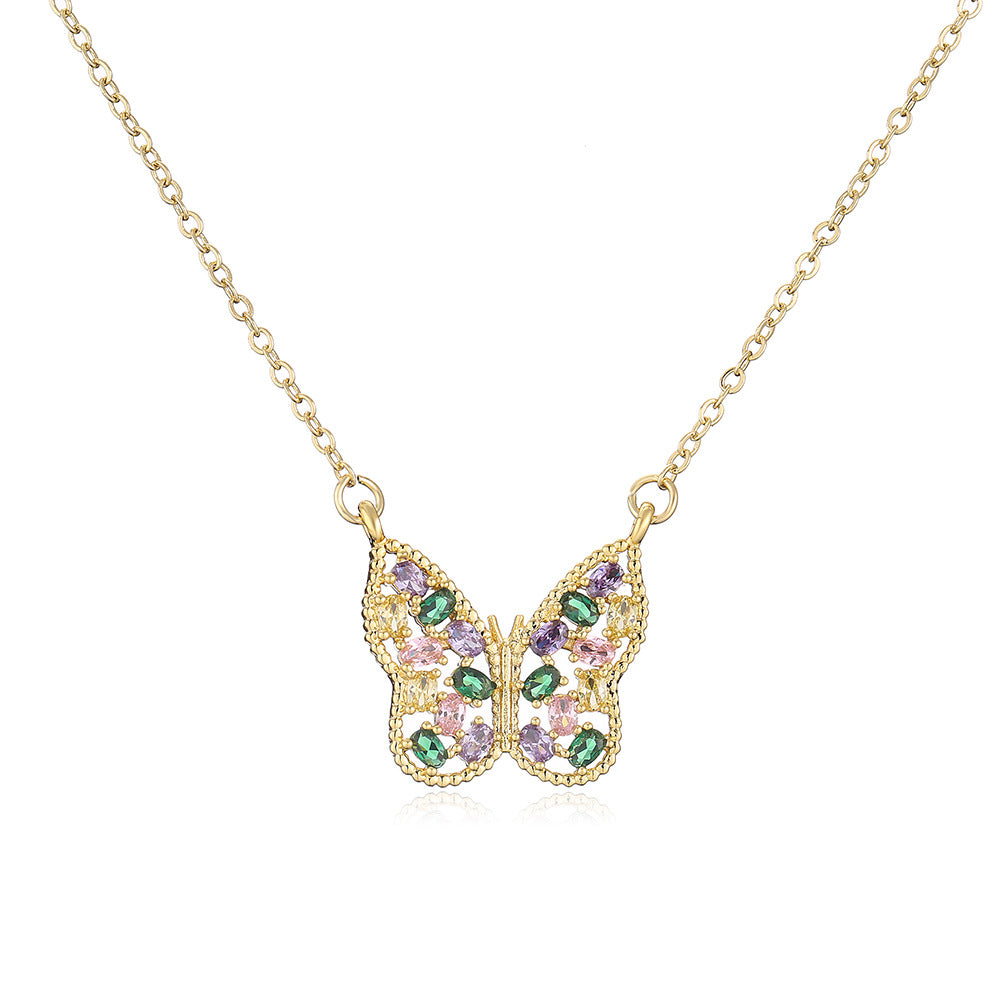 Minimalist Butterfly-Shaped Geometric Pendant Necklace for Women with Gold-Plated Copper Base and Micro-Paved Zirconia and Pearl Accents