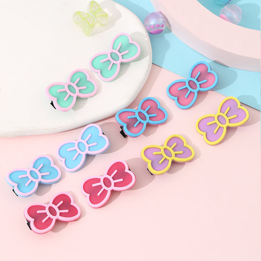Juego de pinzas de pelo con lazo y mariposa de dibujos animados para niños, accesorios de resina hechos a mano con diseños variados