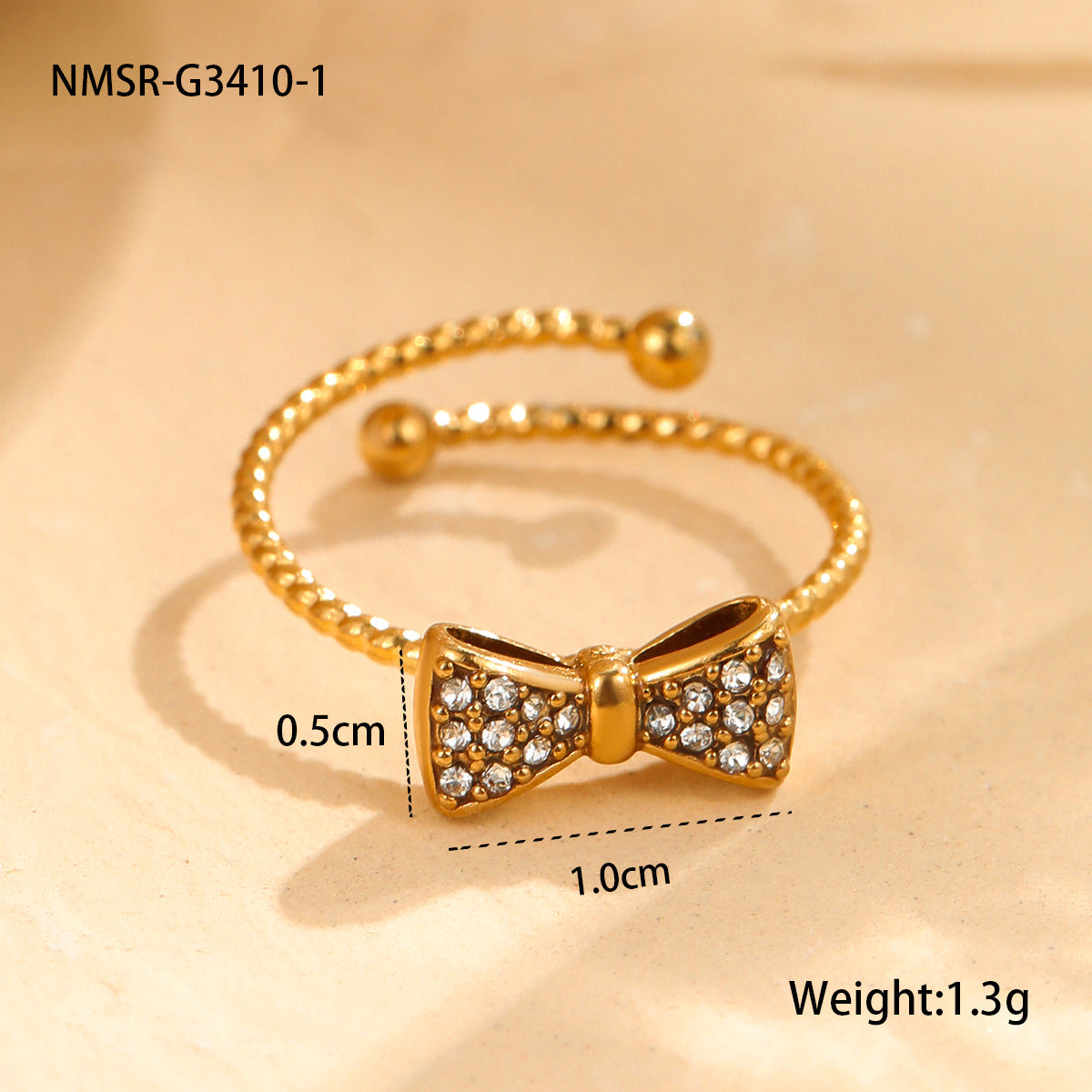 Anillo de acero inoxidable con forma de lazo, engaste de diamantes de imitación, estilo minimalista y lujoso para mujer