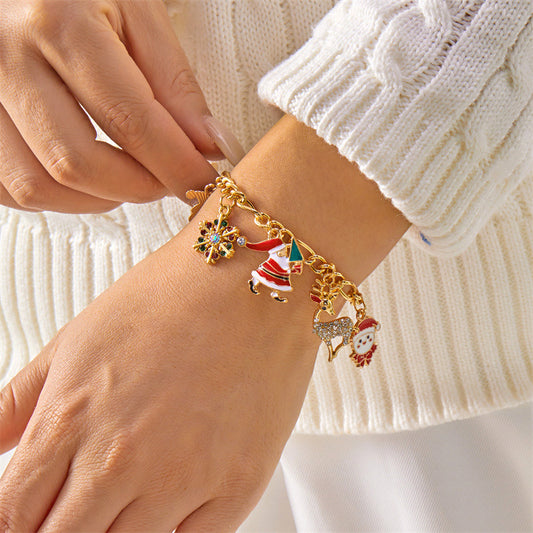 Pulsera de aleación artesanal de moda con motivos navideños, dijes de Papá Noel y copos de nieve para mujer