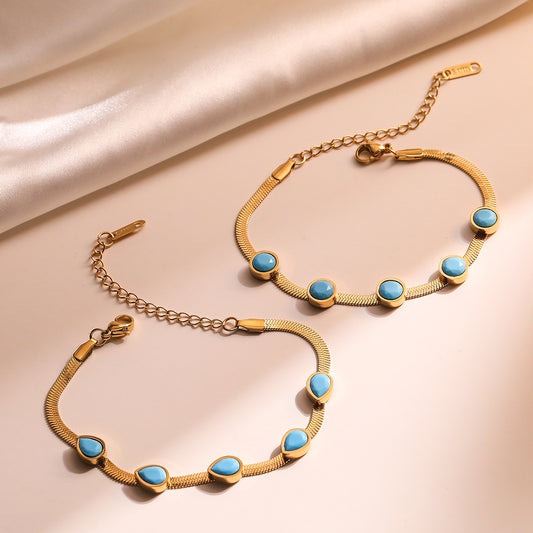 Bracciale da donna in acciaio al titanio, geometrico minimalista, placcato oro e con intarsio in turchese