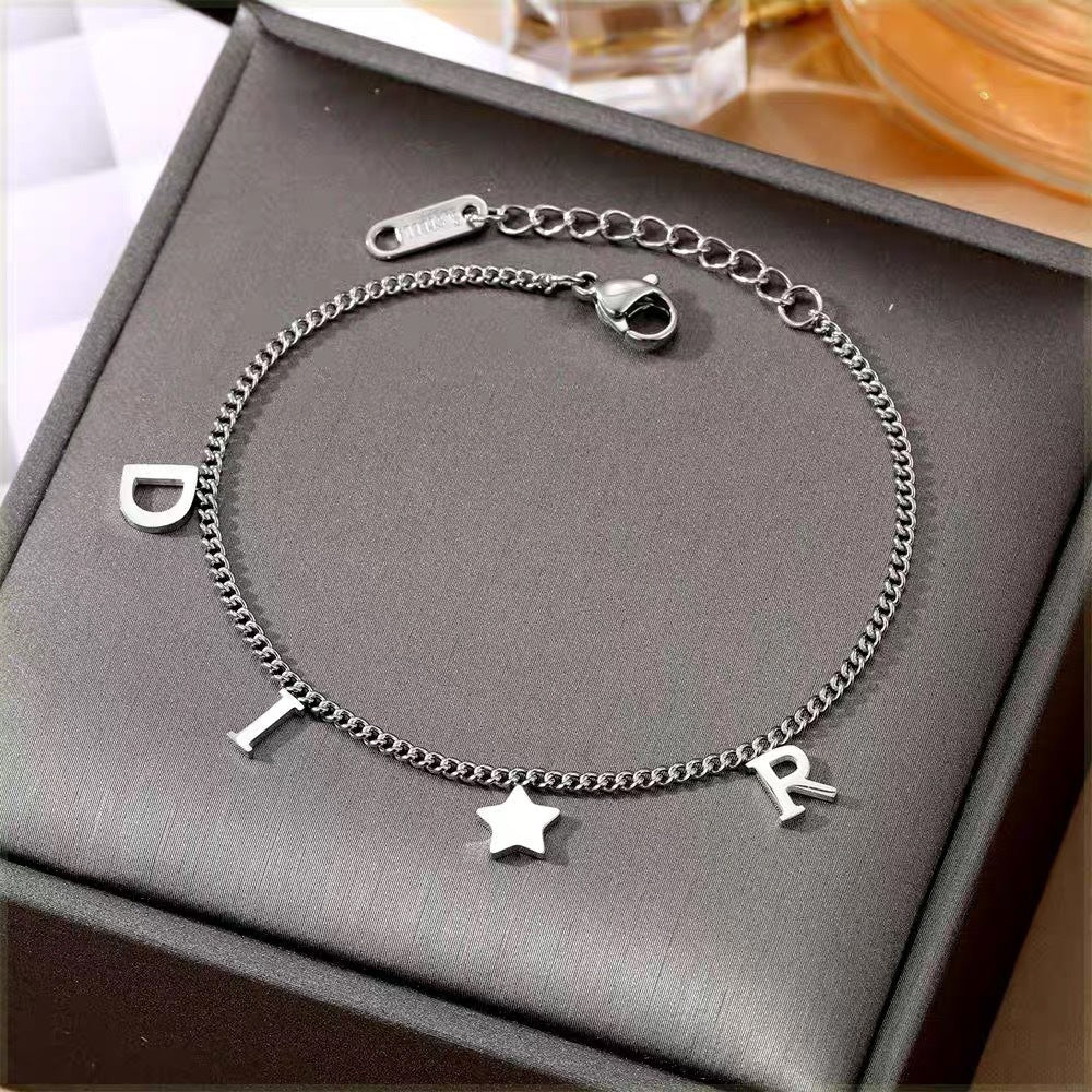 Braccialetto Minimalista a Stella in Acciaio al Titanio da Donna con Intarsio di Strass, Design Regolabile