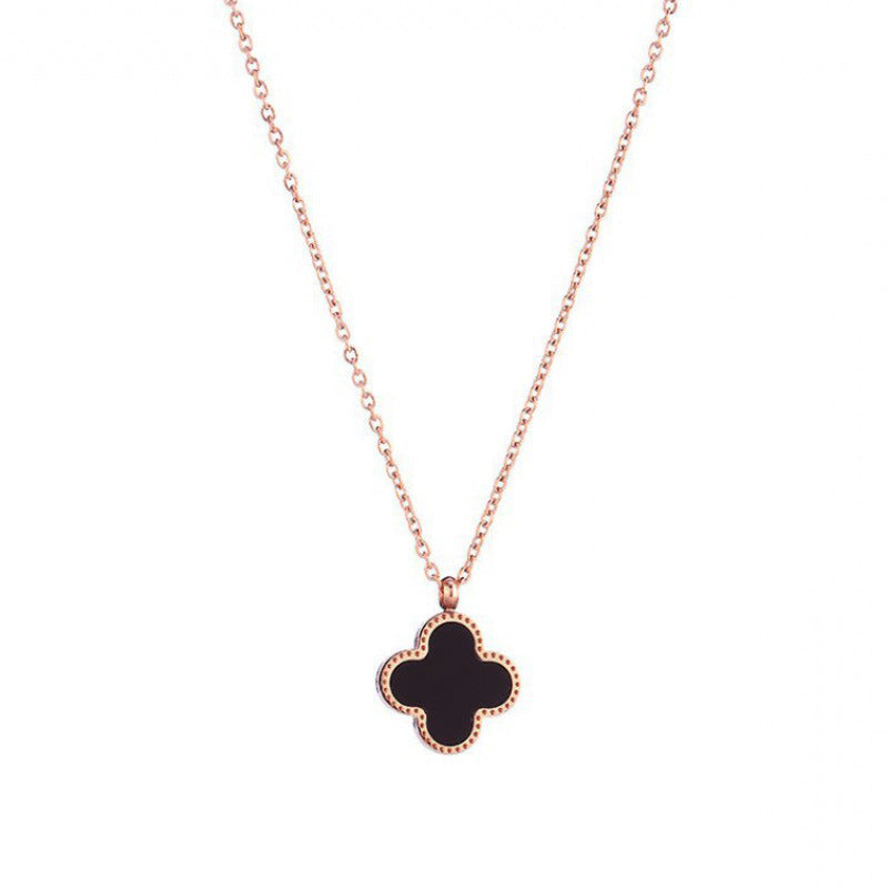 Collana da donna a ciondolo minimalista a quadrifoglio in acciaio al titanio con catena a croce