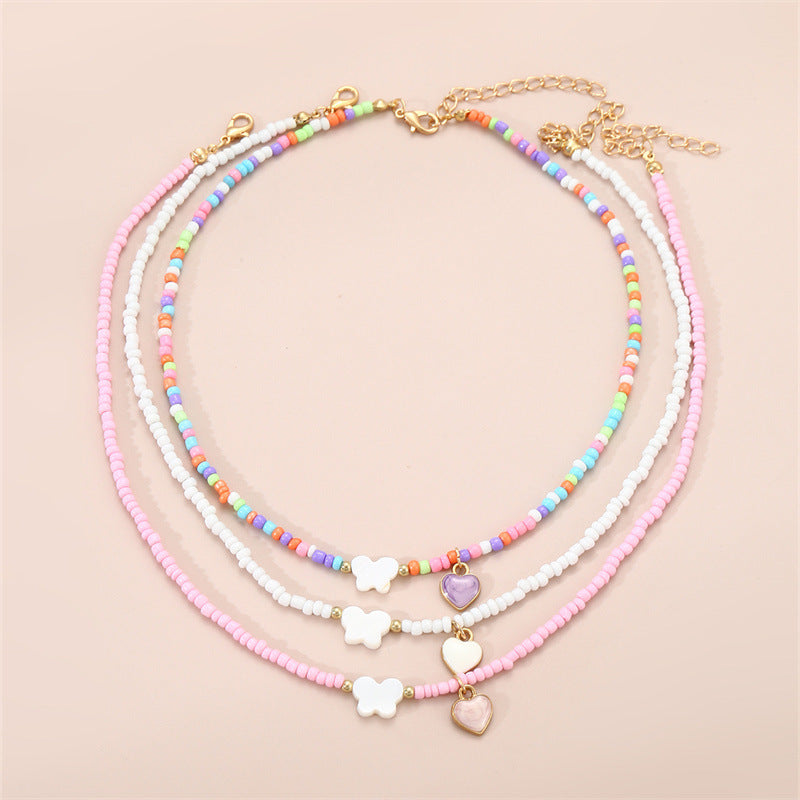 Collana con Ciondolo a Farfalla Smaltata in Stile Bohemien con Perle di Vetro per Bambini, Catenina con Perline Rotonde Fatta a Mano