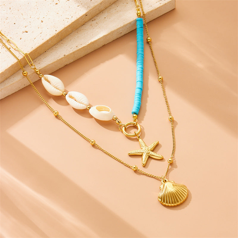 Collana a strati con ciondolo a stella marina e perla in acciaio inossidabile Fashion Office con charm a conchiglia e catena a scatola color oro
