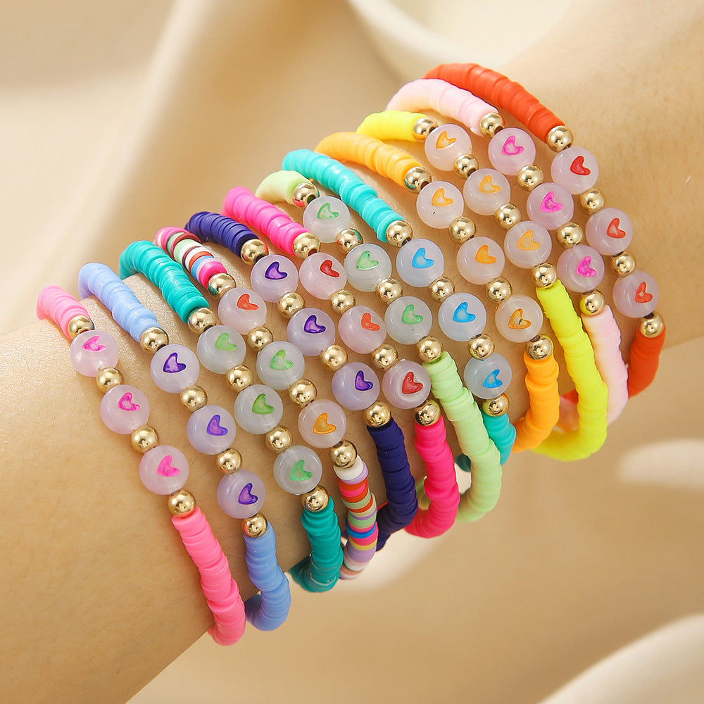 Colorful Glow-in-the-Dark Heart Polymer Clay and Brass Bead Stretch Bracelet with Letter Elements