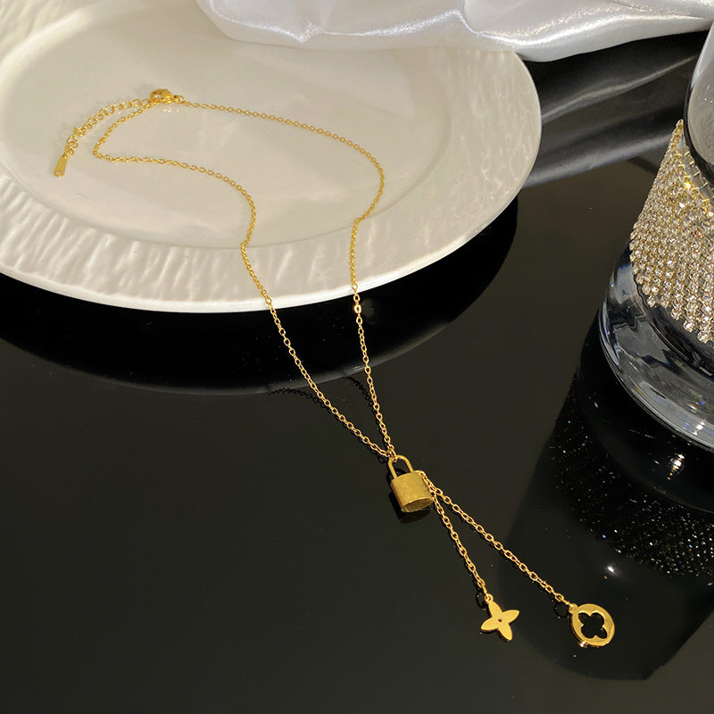 Geometric Titanium Steel Plated Lock Clover Tassel Necklace