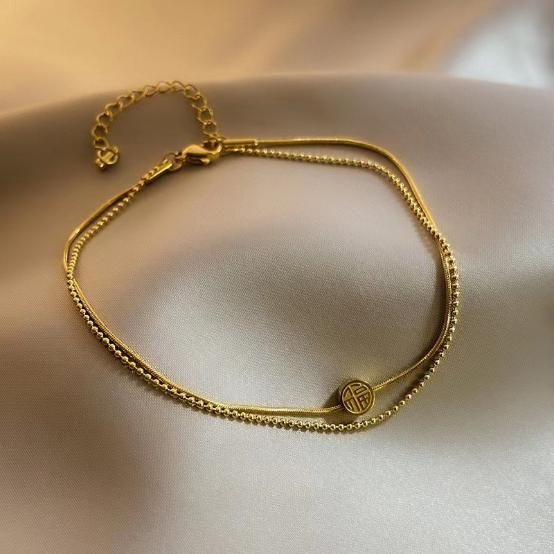 Cavigliera in acciaio al titanio con motivo geometrico in stile etnico da donna, con design a doppio strato e gioielli delicati per i piedi