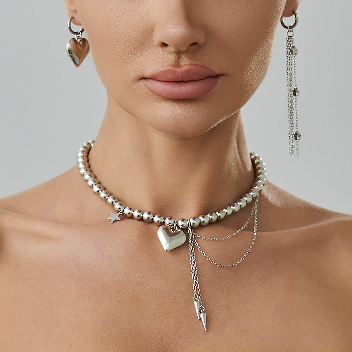 Girocollo con pendente a stella e cuore dolce e audace con nappe da donna