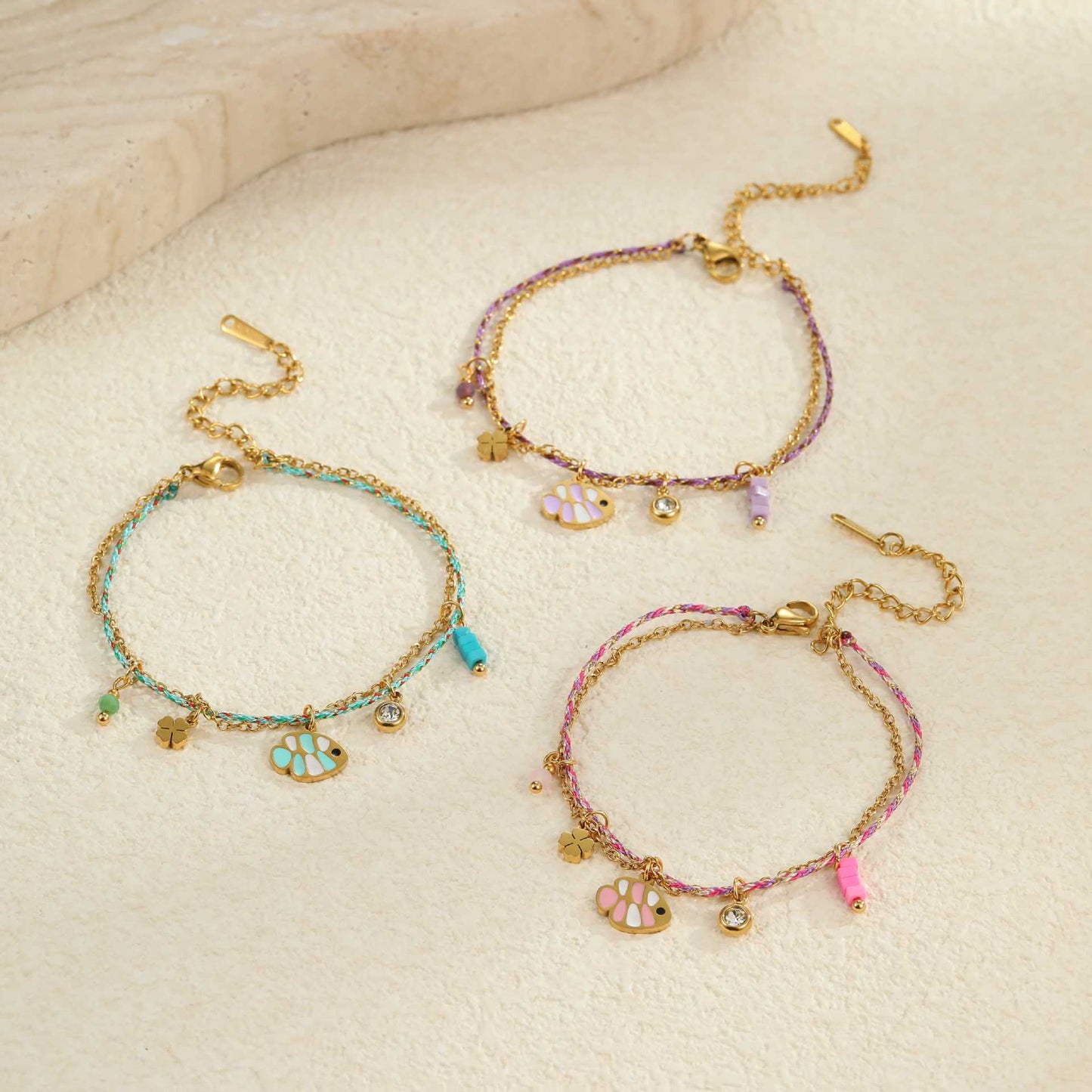 Fashionable Ocean-Inspired Braided Stainless Steel Bracelet with 18K Gold Plating and Zirconia Fish Pendant for Women