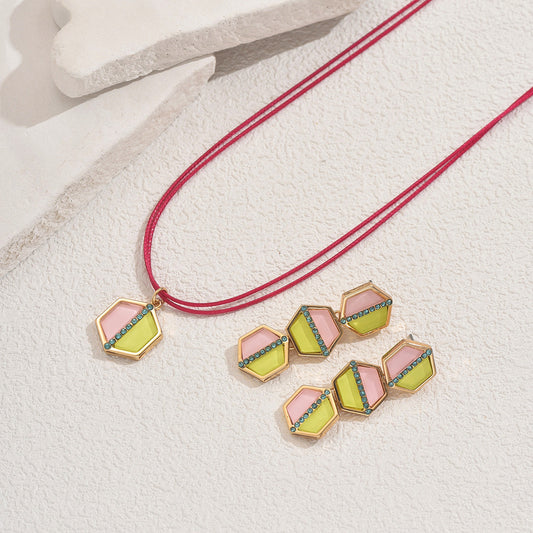 Parure da donna con collana e orecchini geometrici in rame con intarsio di strass, design pendente lungo irregolare