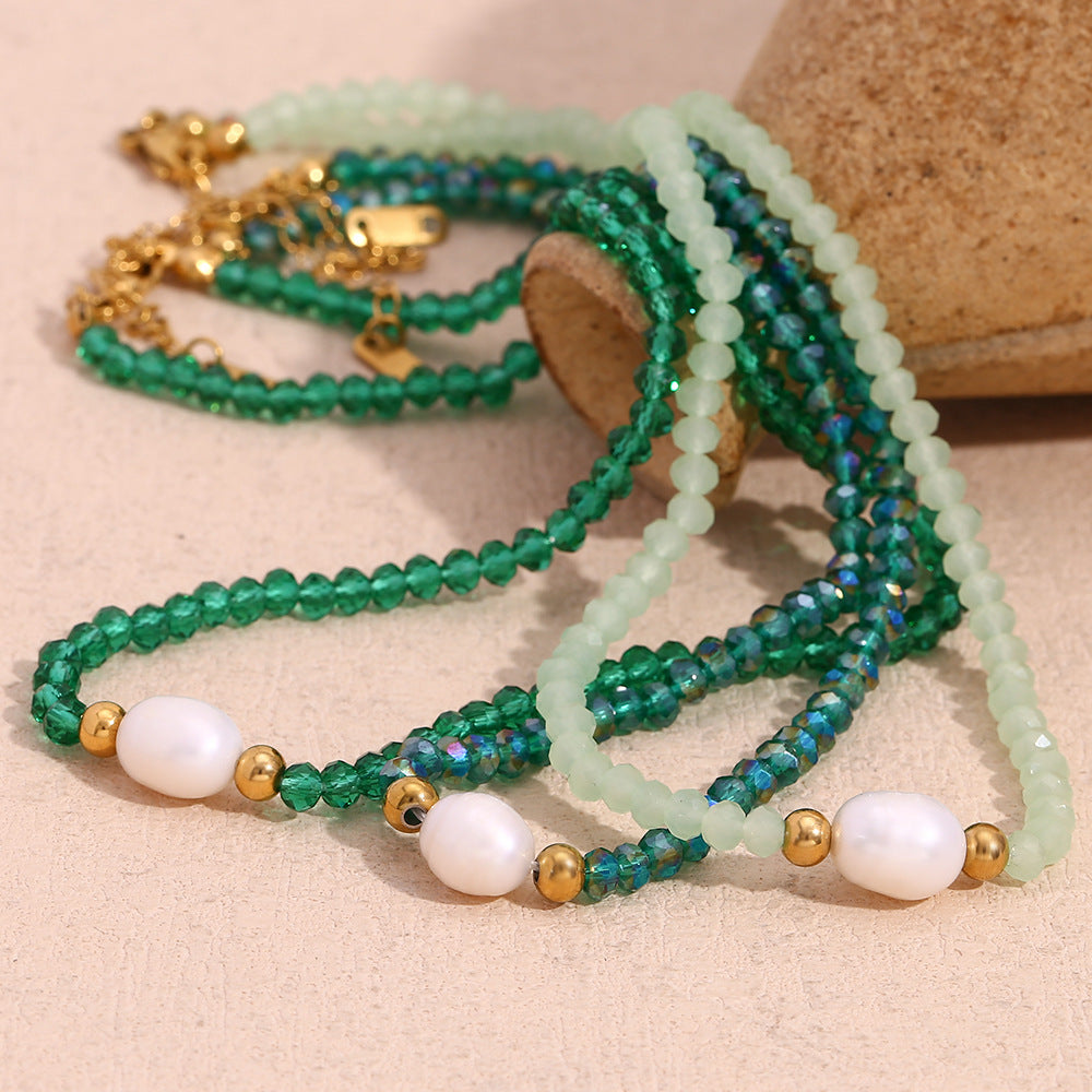 Collana da donna alla moda minimalista geometrica verde Mamba in acciaio inossidabile con singola perla d'acqua dolce e perline di cristallo