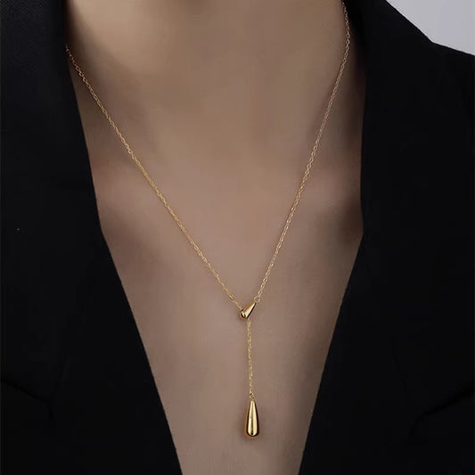 Minimalist Cold-Tone Water Drop Necklace for Women Titanium Steel Plated Delicate Clavicle Chain with Irregular Design