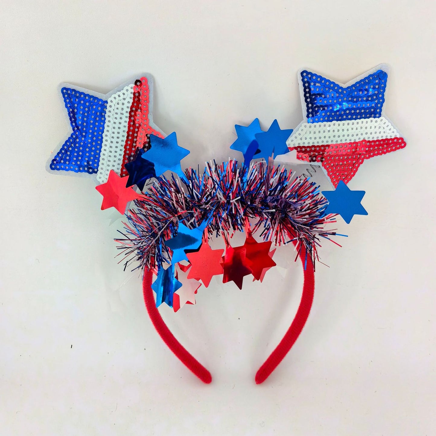 Cerchietto con paillettes a stella rosse, bianche e blu per la decorazione della festa dell'Independence Day