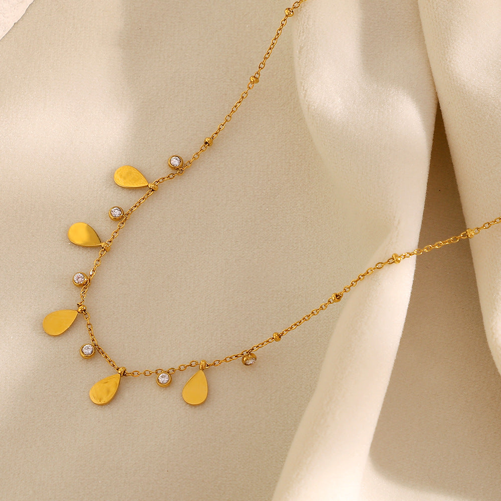 Collana pendente minimalista in acciaio inossidabile a forma di goccia con placcatura in oro 18K e intarsio di zirconi per donne