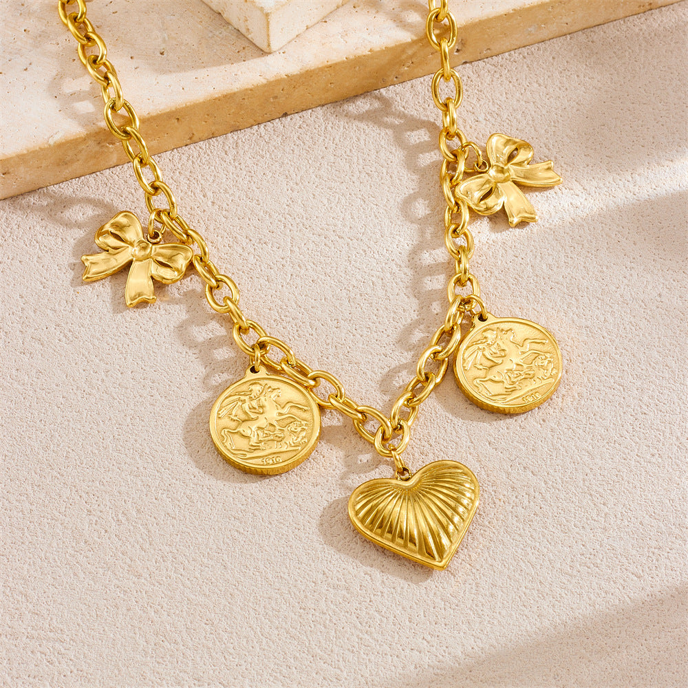 Vintage Style Heart and Bow Pendant Necklace in Stainless Steel with Gold Plating on O-Chain