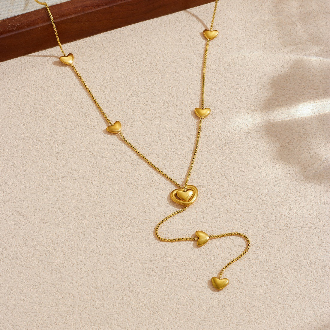 Minimalist Hollow Heart Gold Plated Stainless Steel Y-Chain Long Tassel Necklace for Women