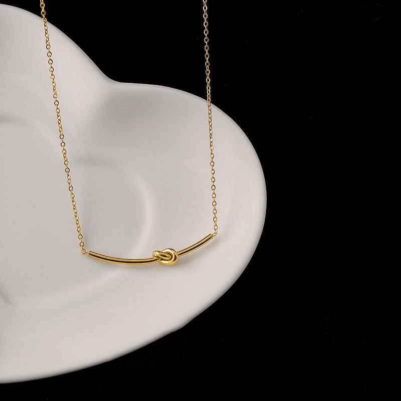 Collana Minimalista Geometrica Placcata in Acciaio Titanio con Ciondolo a Fiocco per Donna, Catena Regolabile