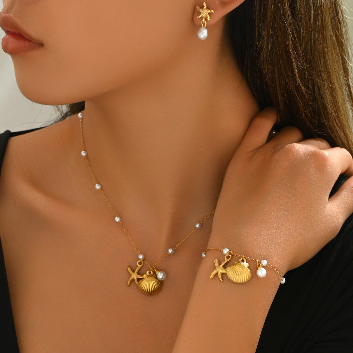 Conjunto de pendientes, pulsera y collar de mujer de conchas y perlas inspirado en el océano, con motivo de estrellas de mar y artesanía incrustada