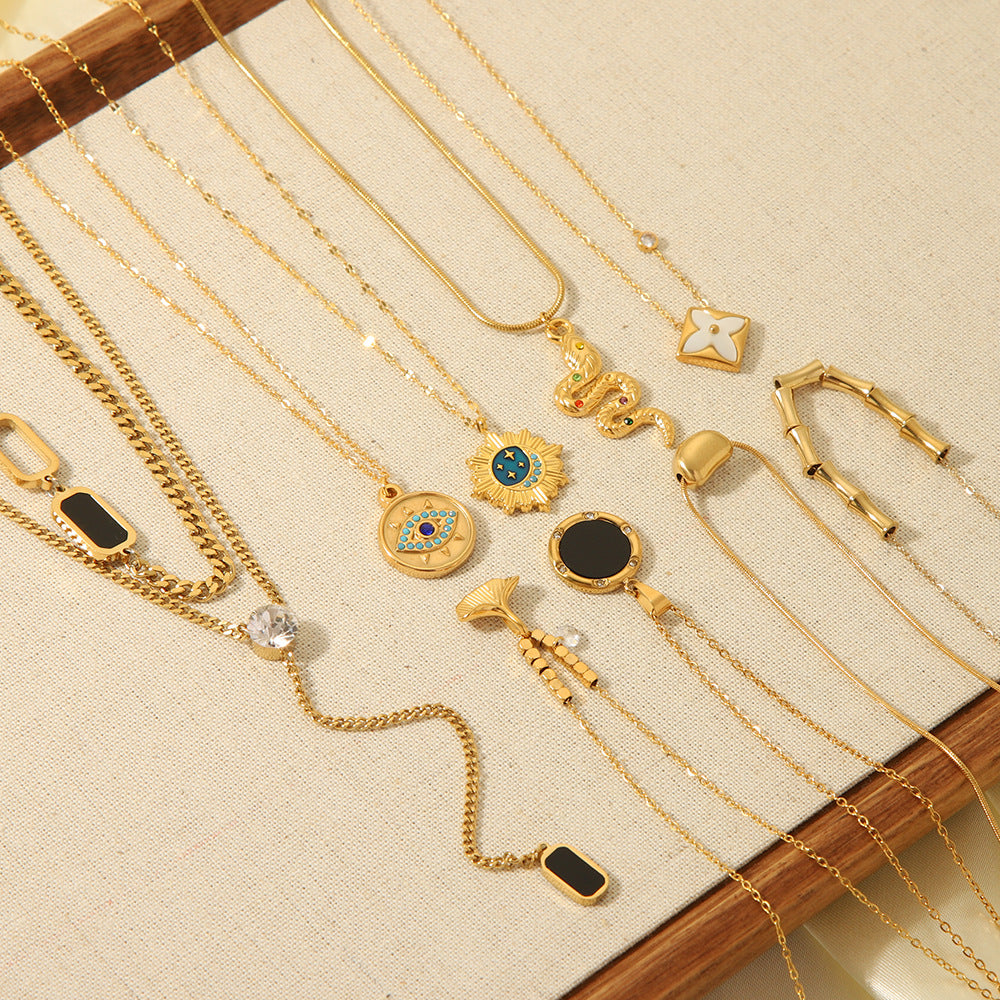 Minimalist Stainless Steel Snake-Eye Bamboo-Shaped Pendant Necklace for Women with 18K Gold Plating and Zircon Inlay