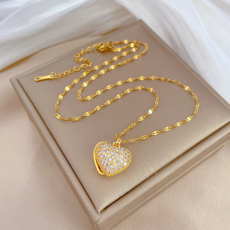 Collana con pendente a cuore in acciaio al titanio di lusso con perle e conchiglie per uomo e donna