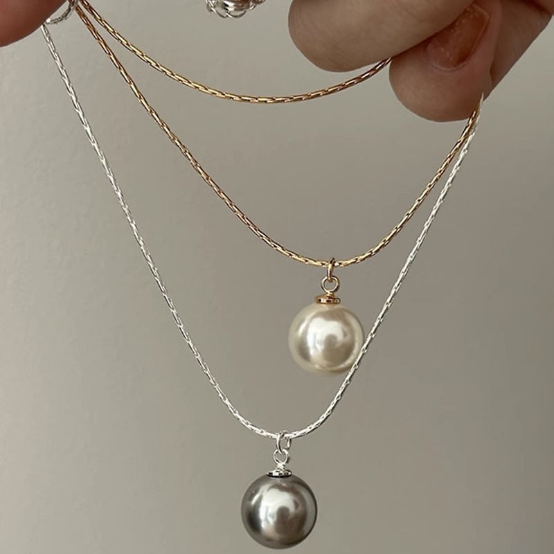Collana girocollo minimalista con pendente di perla per donna, catena a serpente in acciaio al titanio con forma animale irregolare e finitura galvanizzata