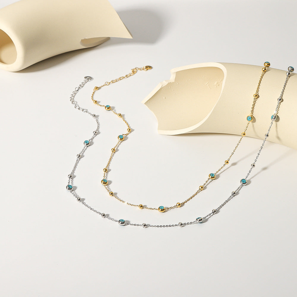 Collana da donna a serpente minimalista geometrica in acciaio inossidabile con intarsio in turchese, placcatura in oro 18K sottovuoto