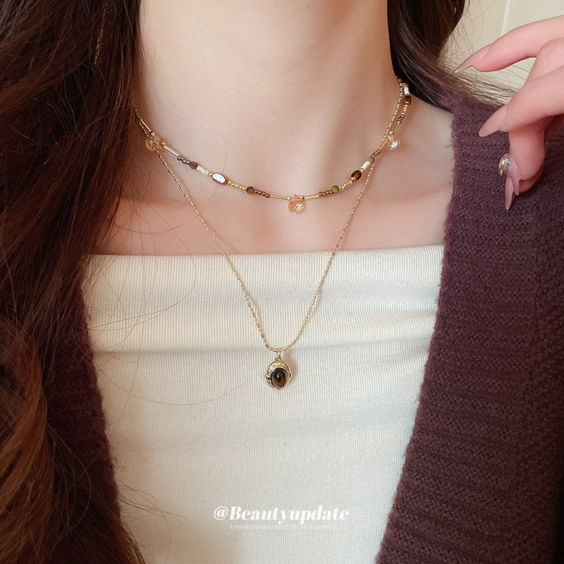 Collana pendente occhio di tigre in stile retrò con design geometrico da donna, catena a maglie color oro, accessorio minimalista di lusso