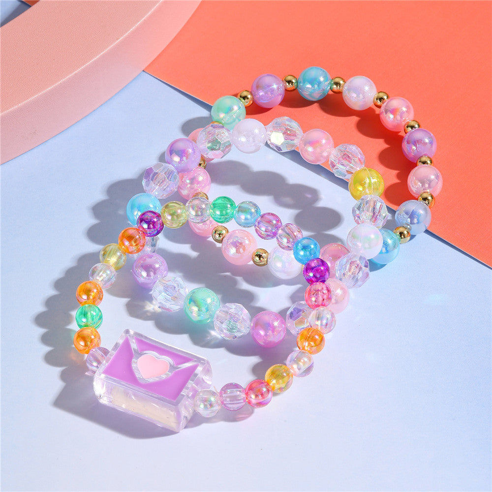 Juego de pulseras de resina con cuentas en forma de corazón estilo caricatura con dijes de cola de sirena y conchas marinas para niños