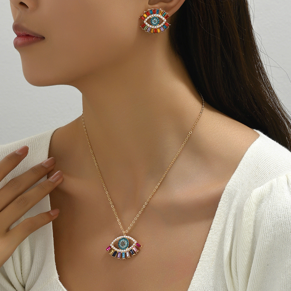 Juego de collar con colgante de ojo de ángel de estilo hip hop minimalista y pendientes de tuerca para mujer, aleación con incrustaciones de diamantes de imitación