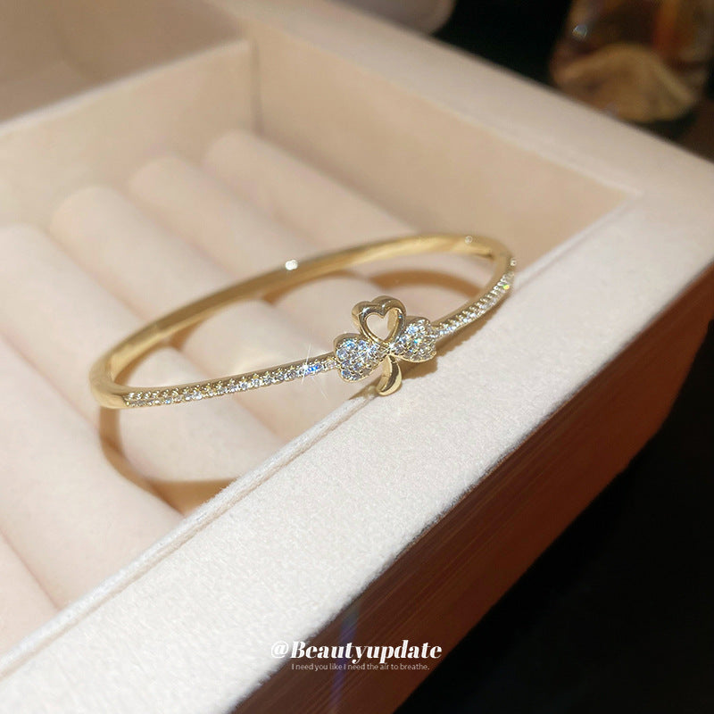 Pulsera tipo brazalete de aleación de cobre bañada en oro de lujo con incrustaciones de diamantes de imitación para mujer