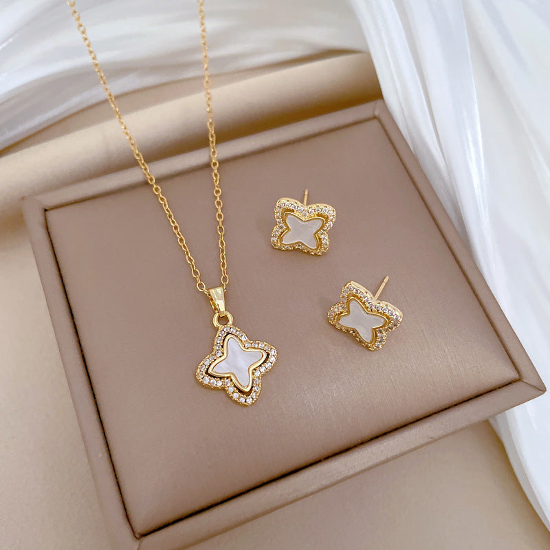 Conjunto de collar y pendientes de lujo de acero de titanio con diseño geométrico