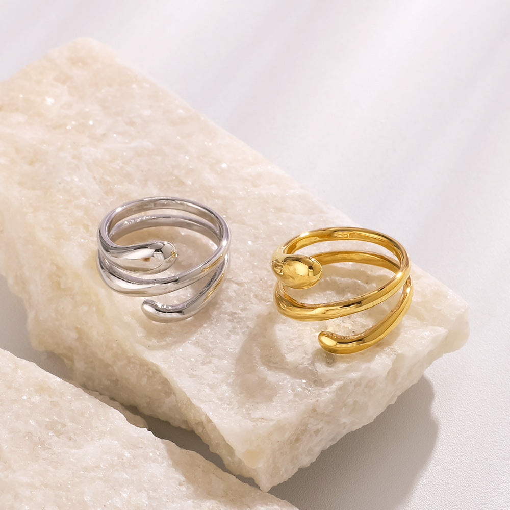 Anello multistrato minimalista in acciaio inossidabile lucidato da donna con forme geometriche e a goccia e placcatura sottovuoto in oro 18 carati