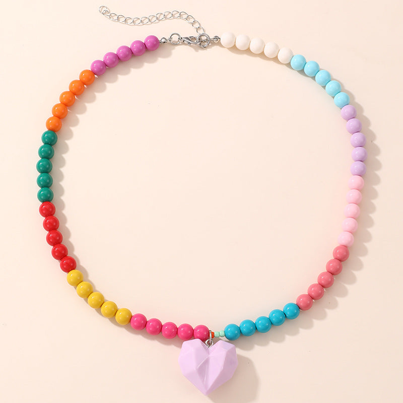 Lindo Collar de Resina con Forma de Lazo para Niñas con Acabado Pintado en Diseño Multicolor, Joyería Infantil Dulce y Juguetona