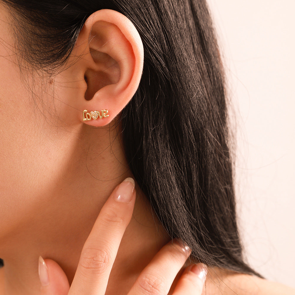 Streetwear Brass Inlaid with Cubic Zirconia Heart Cross Stud Earrings for Women