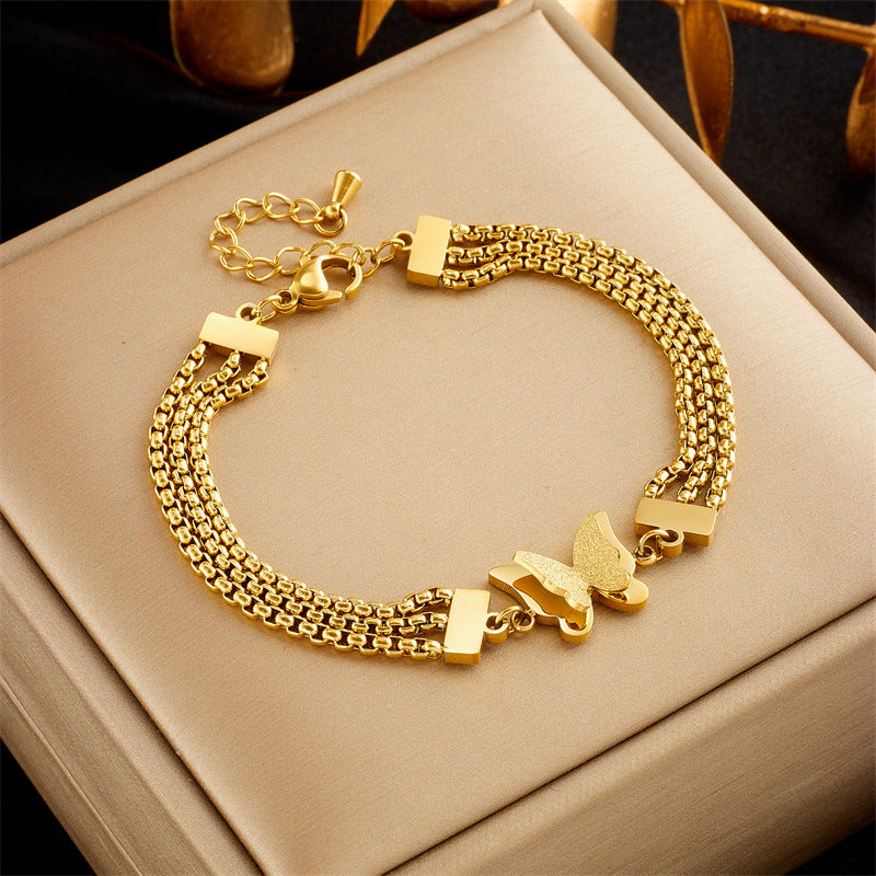 Fashionable Minimalist Heart-Shaped Rhinestone-Embellished Stainless Steel Bracelet with Multi-Layer Snake Chain and Butterfly Charm for Women