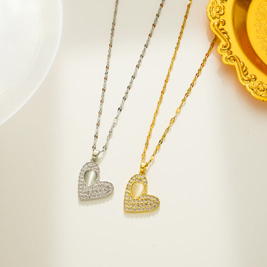 Collana da donna a cuore in acciaio al titanio, lusso minimalista, con intarsio in pietra occhio di gatto e zirconi cubici